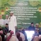 Yayasan Al-Ikhlas Assalam dan SMK Mutiara Bangsa sukses bagikan 1000 paket sembako dan santunan anak yatim, bantu meringankan beban masyarakat. (Foto: Ahmad/Metrosiar) 