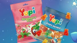 Logo PT Yupi Indo Jelly Gum dengan ilustrasi permen gummy, menandai langkah perusahaan menuju IPO di Bursa Efek Indonesia pada 2025. (Dok. Yupi)
