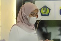 Ilustrasi seorang pekerja sedang berada di salah satu kantor pajak. (Istimewa)