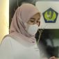 Ilustrasi seorang pekerja sedang berada di salah satu kantor pajak. (Istimewa)