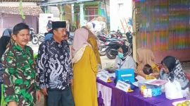 Tangkapan Layar Kepala Desa Benda, di dampingi Babinsa Benda dalam kesempatan itu menyampaikan apresiasi terhadap semangat gotong royong warga dan kerja keras para kader posyandu. (Istimewa) 