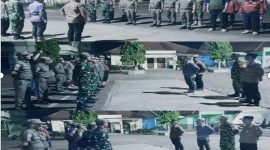 Apel gabungan malam takbiran – Seluruh unsur Forkopimcam, termasuk Camat, Satpol PP, Redkar, Babinsa, dan Binamas berkumpul dalam apel siaga malam takbiran di halaman kantor kecamatan Kemiri. (Dok. Ahmad/Metrosiar). 