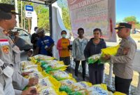 Gerakan Pangan Murah Polres Belu dan Bulog Atambua, 1 ton beras ludes terjual demi stabilitas harga dan pasokan pangan warga. (Tribrata News NTT)