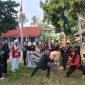 Ilustrasi – Pendekar Banten Korcam Kemiri berkolaborasi dengan Padepokan Pencak Silat Macan Putih Kemiri, menerjunkan ratusan anggotanya untuk ikut serta dalam kegiatan upacara detik-detik Proklamasi ke-80 yang di gelar di Stadion Mini Kecamatan Kemiri, Minggu (17/08/25). (Foto: Rizky/Metrosiar)
