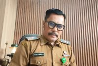 Lurah Kutabumi, Ade Sunaryo, S.Pd., M.M., memberikan penjelasan terkait status pemanfaatan fasilitas sosial dan fasilitas umum (fasos fasum) di wilayah RW 09 Kelurahan Kutabumi, yang hingga kini masih menunggu proses serah terima dari pihak pengembang kepada pemerintah daerah.