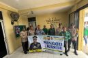 Personel Polsek Tigaraksa bersama pengurus gereja berfoto usai kegiatan Minggu Kasih di Gereja GBI Tigaraksa, Kabupaten Tangerang.