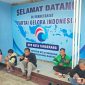 Pengemudi Ojek dan Warga menikmati suguhan dari DPD Parta Gelora Kota Tangerang.