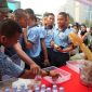 Antusiasme peserta Fun Walk dan Fun Run saat menerima makanan dan minuman di Stand UMKM Kodim 0510/Tigaraksa.